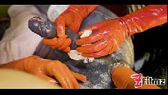 Two latex dominatrix sissy femdom anal fisting